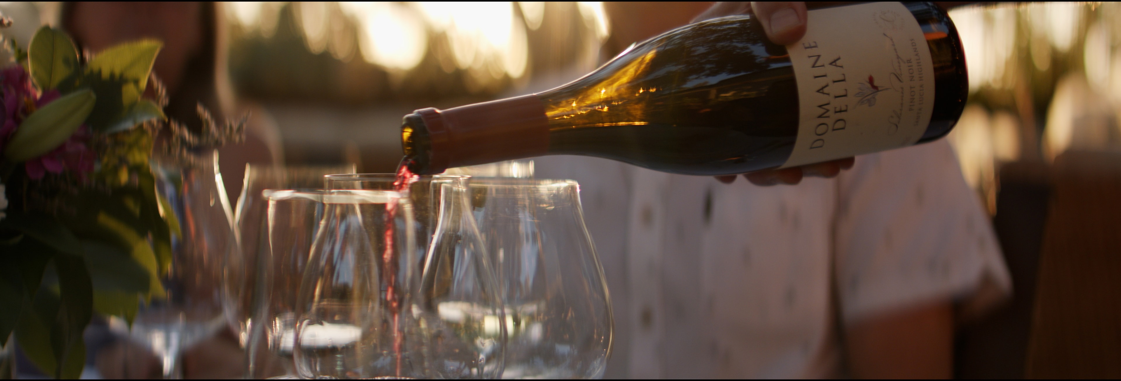 Wine being poured into glasses